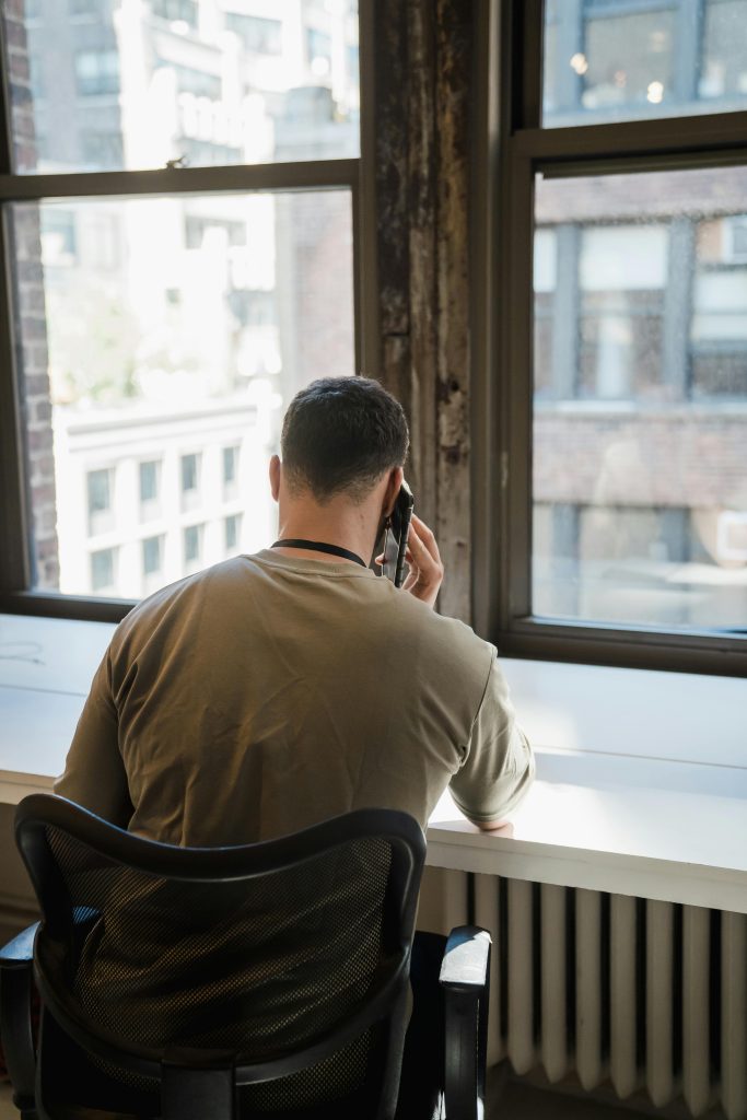 Seated Person Making a Phone Call