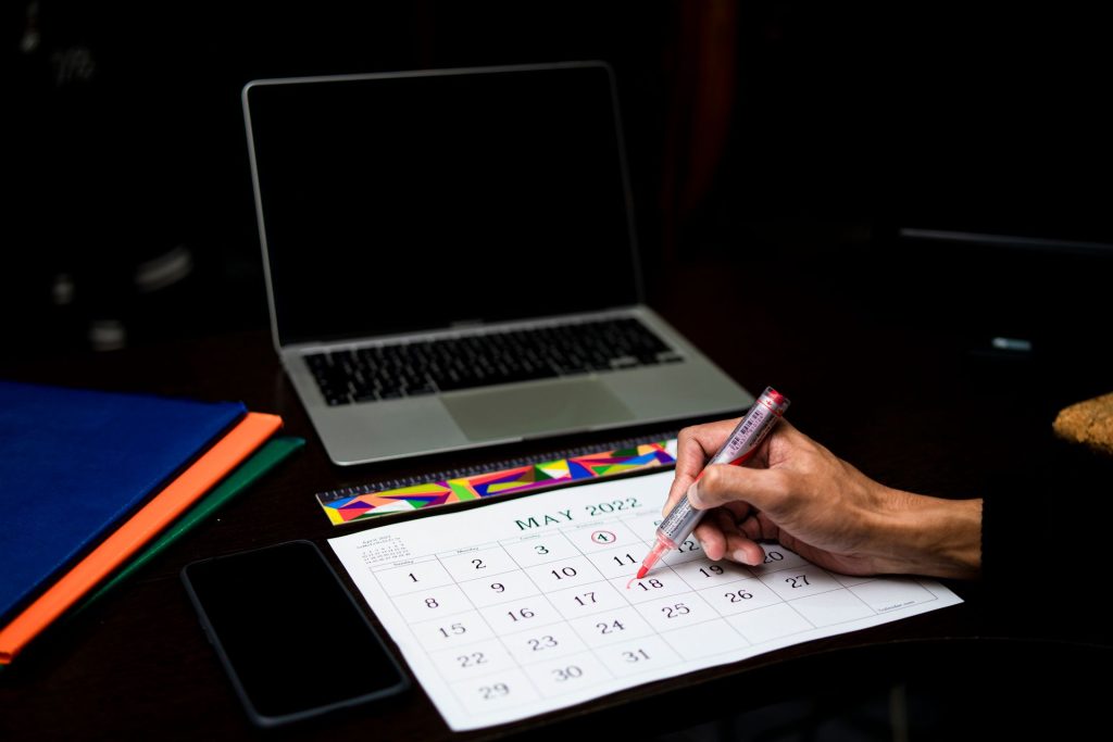 A hand circles a date on a desk calendar representing a Pennsylvania personal injury filing deadline.